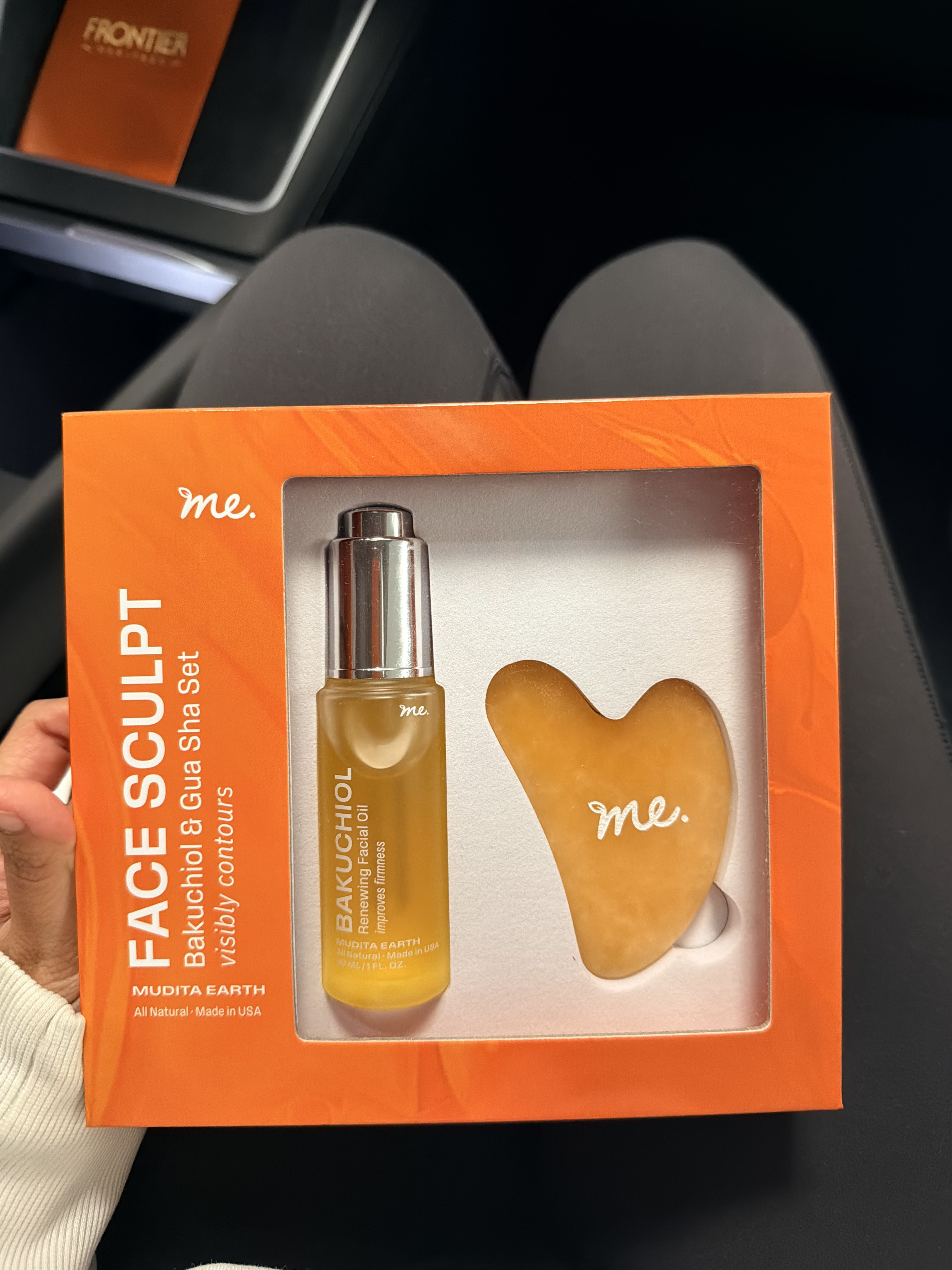 Mudita Earth Face Sculpt set - casual photo on airplane seat